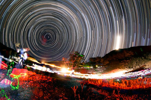 EAN 7435720093002 product image for Astronomers observe polar star trails above a mountain in Iran Poster Print by A | upcitemdb.com