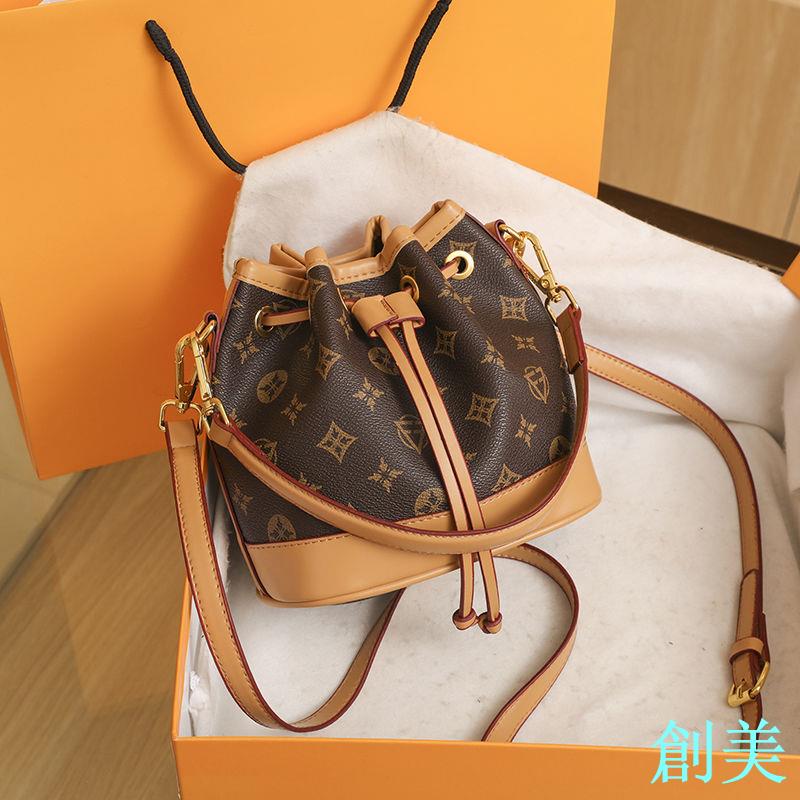 包包迷你2024新款女包水桶時尚皮u單肩包女老花抽繩手提斜挎女包-創美