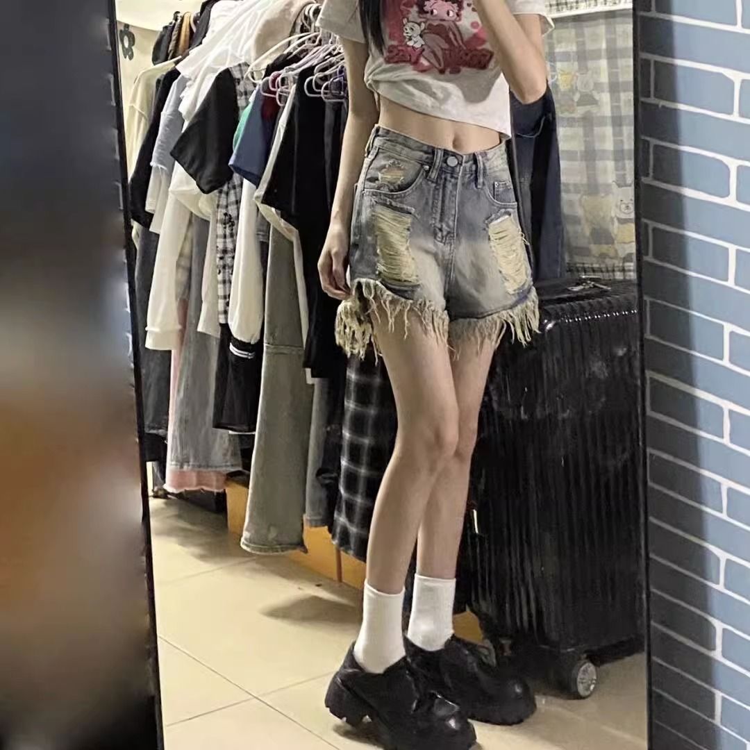 高街ins毛邊破洞牛仔短褲女夏季新款復古小眾設計感闊腿A字熱褲子—貼心服飾