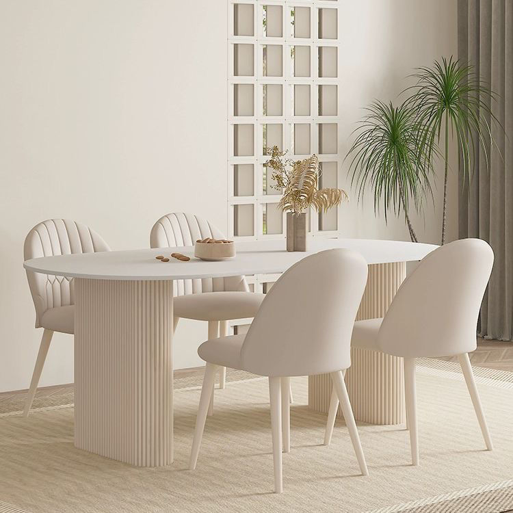 奶油風純白巖板餐桌家用輕奢現代簡約小戶型法式橢圓形餐桌椅組合