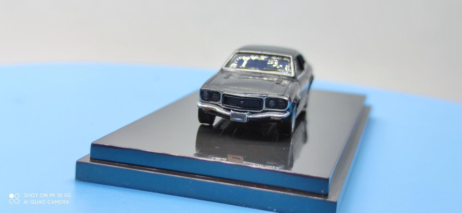 1:64 Mazda Rx-3 KYOSHO 如圖所示
