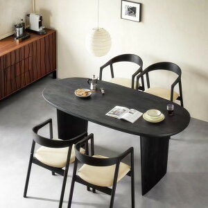 餐桌 北歐設計師實木餐桌小戶型黑色橢圓形原木創意飯桌