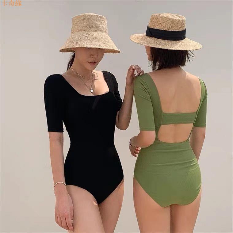 日韓新款2024純色泳衣女性感露背遮肚顯瘦短袖保守連體溫泉泳裝