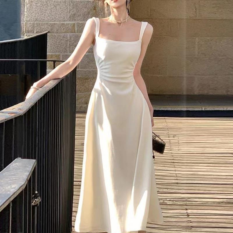楓林宜居 白色吊帶連衣裙2023女新款a字法式收腰小眾設計長裙子