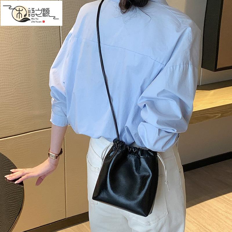 【臺灣公司貨】通勤包包女士新款小眾高階感單肩斜挎真皮水桶包迷你手機包女