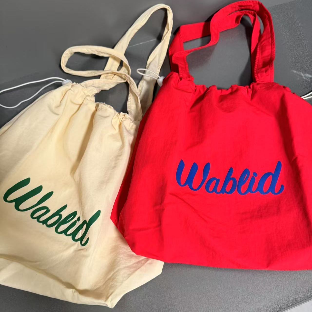 【良品舎】免運/快速出貨/抽繩單肩包女日系ins托特包通勤輕便手提袋學生大容量通勤旅行包L47L