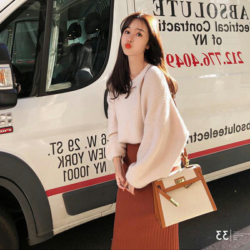一個女孩的衣櫥--韓國東大門-韓版厚版V領燈籠袖質感毛衣+厚版直線坑條厚磅窄裙 2件套組 "3色" S-XL