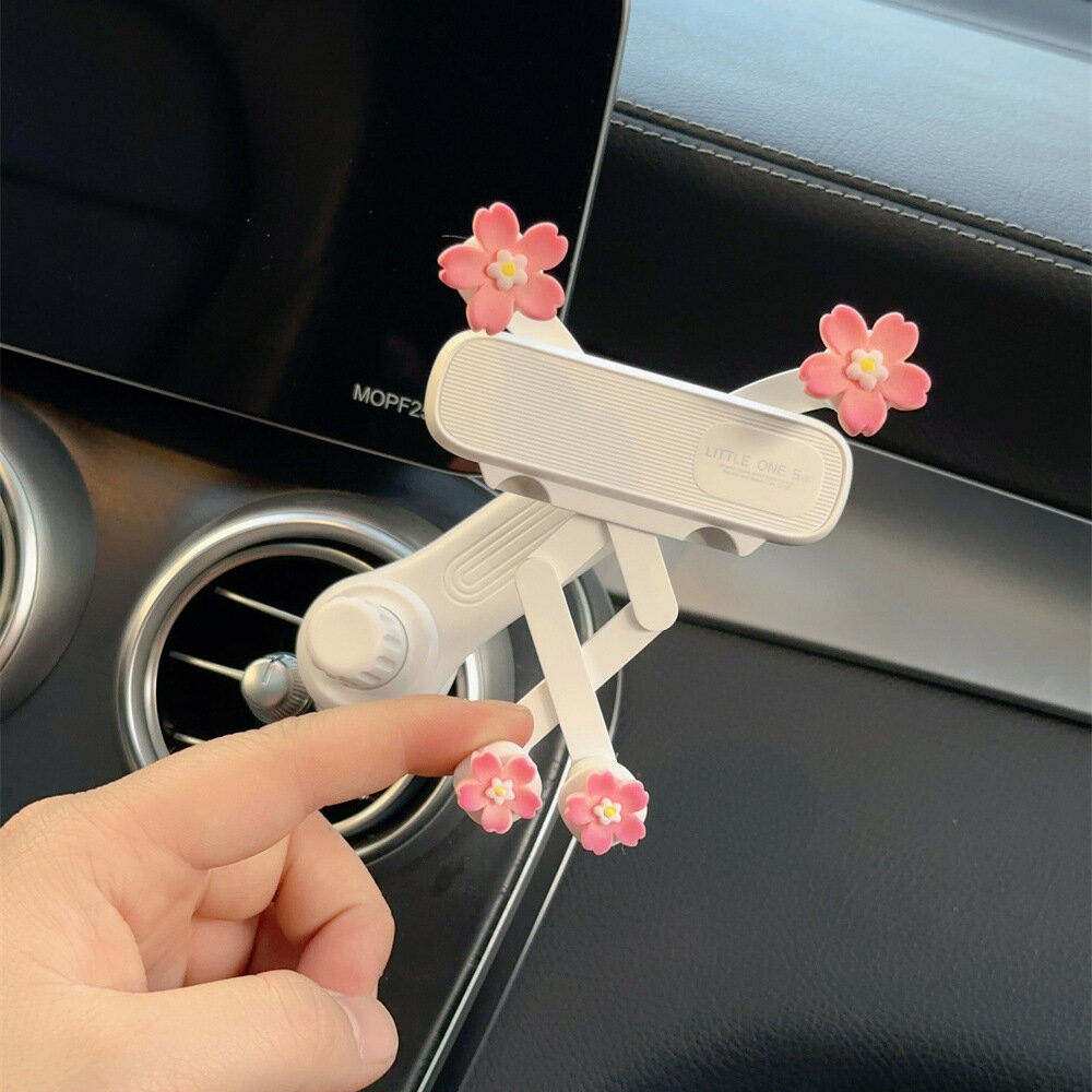 車用手機架汽車導航用創意出風口旋轉重力支撐架多功能手機支架女