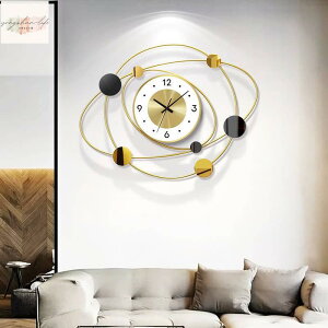 鐘錶 橢圓形掛鐘 客廳 星球 金屬簡約家用靜音時鐘北歐 掛牆個性時尚裝飾掛錶
