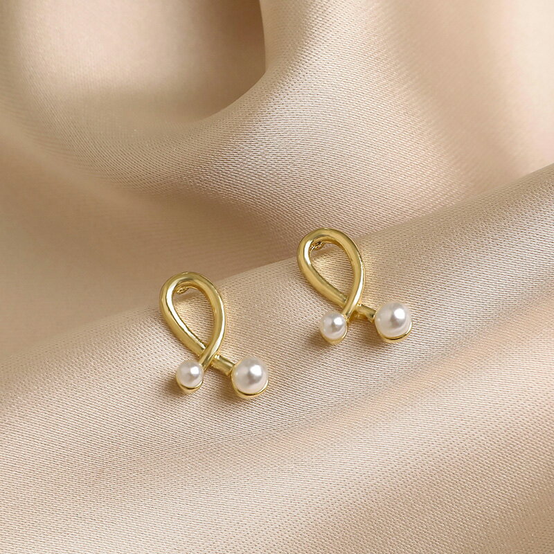 珍珠交叉耳釘女2020年新款潮韓國氣質925銀針耳環高級感小巧耳飾