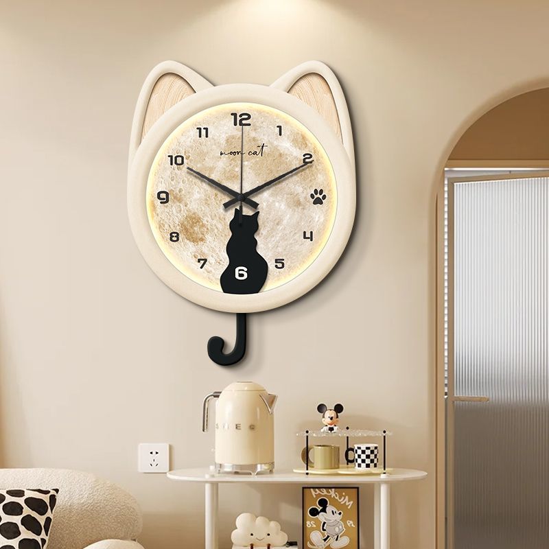 貓咪掛鐘客廳2024新款網紅家用靜音鐘表創意搖擺時鐘掛墻表免打孔
