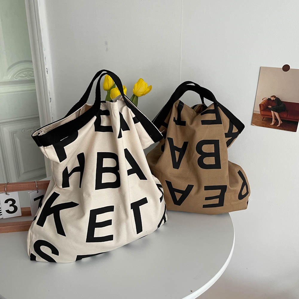 法式小眾藝術托特包設計韓國同款英文字母手提大容量帆布包布袋女