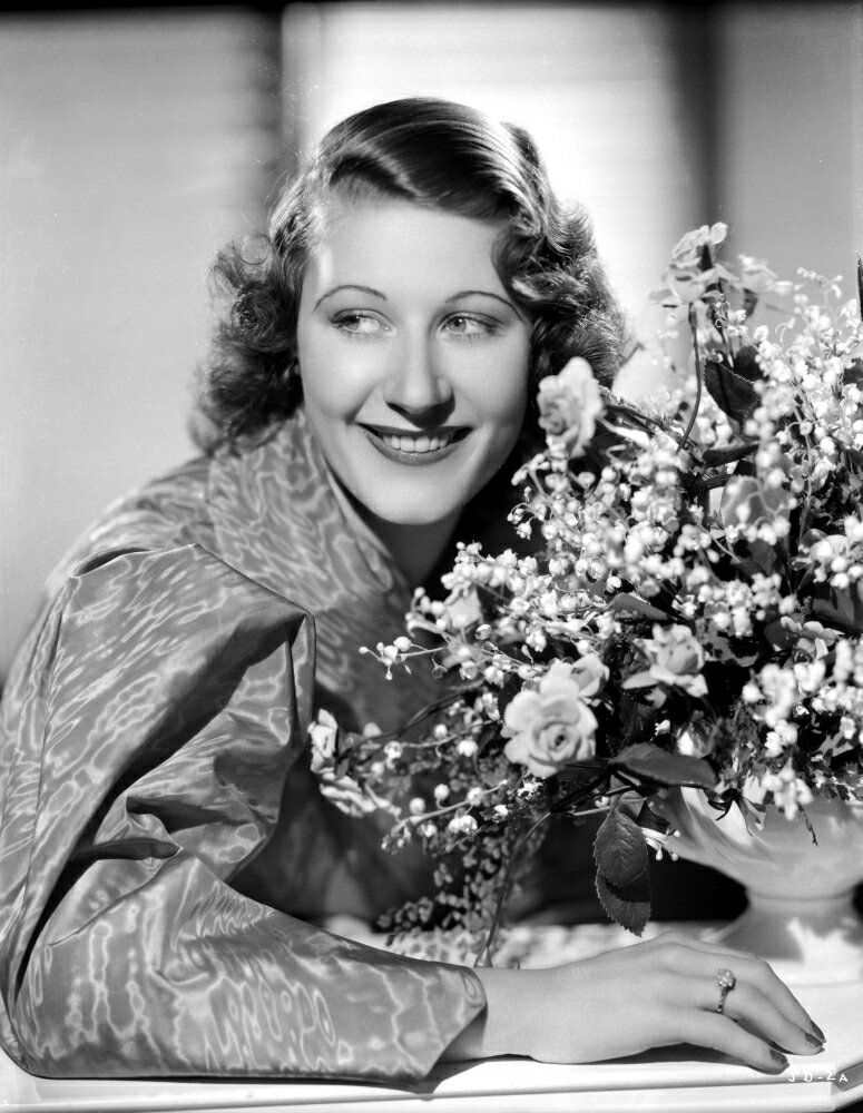 Posterazzi: Joan Davis smiling in A Portrait While Holding A Bouquet of ...