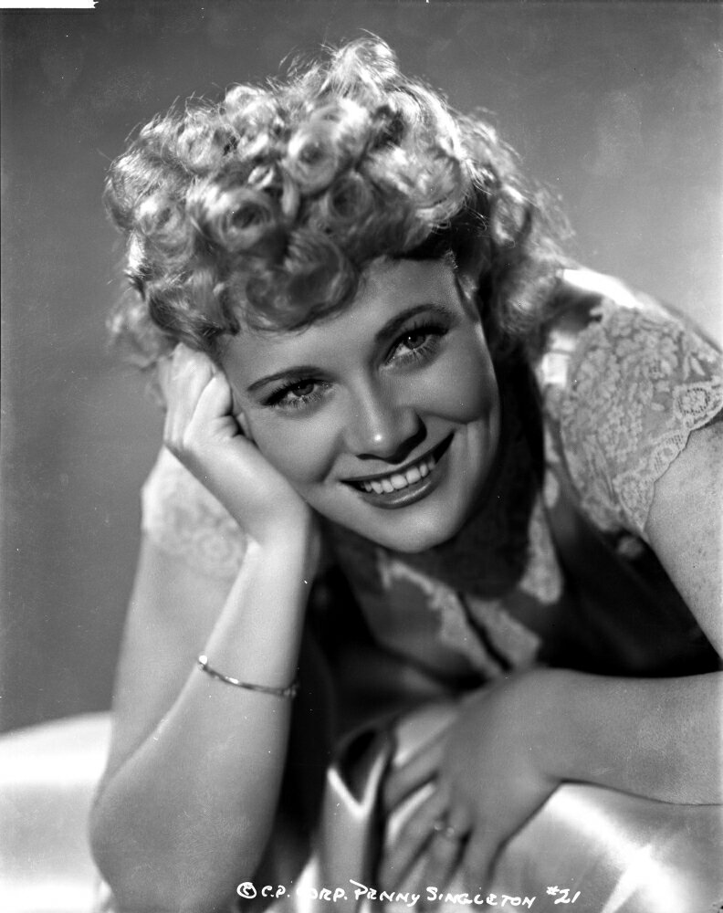 Posterazzi: Penny Singleton smiling with One Hand on Face in Floral ...