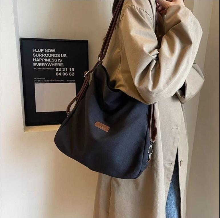 尼龍布包女2024新款春季大容量雙肩包通勤單肩腋下托特包【繁星小鎮】