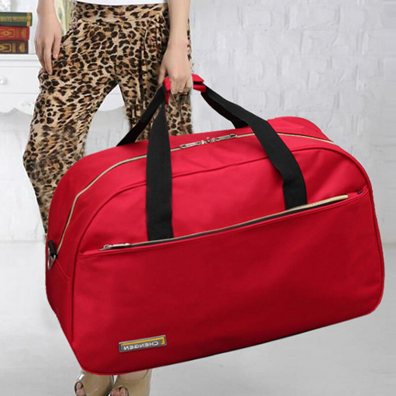 大容量防水手提旅行包大紅女士旅行袋短途行李包出差斜挎男旅游包