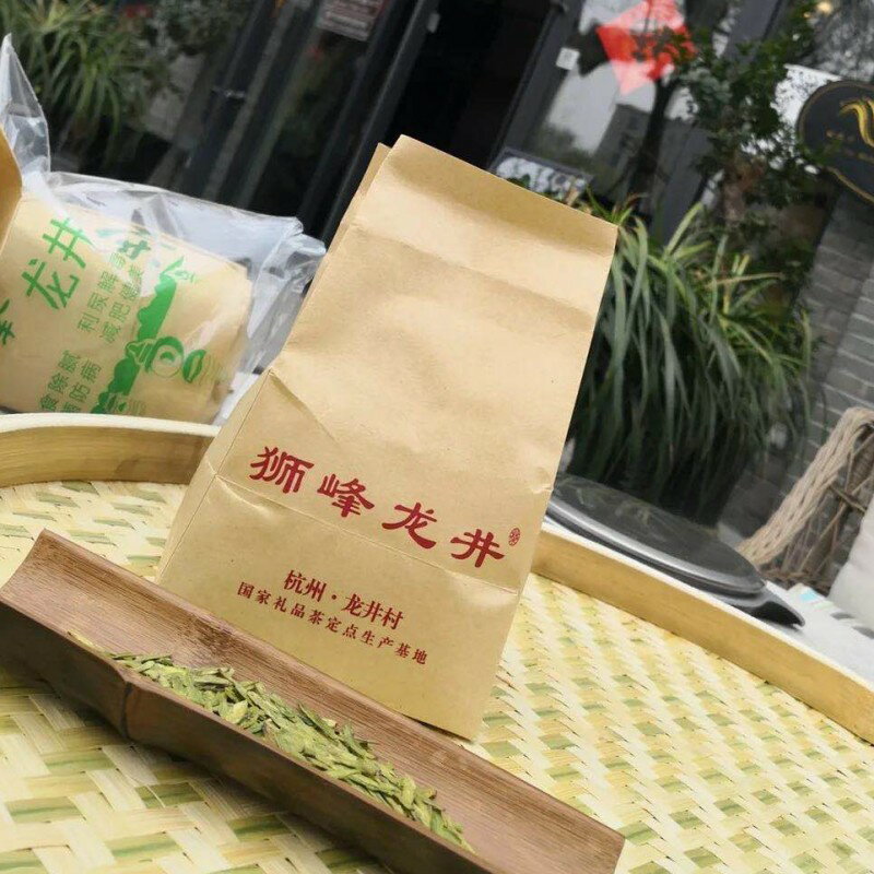 正宗2021年杭州西湖獅峰龍井群體雨前特級茶100g傳統紙包茶農直銷