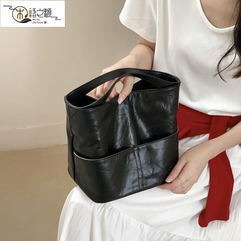 【臺灣公司貨】銀色小眾單肩斜挎水桶包新款女士手提托特包高級感真皮包包女