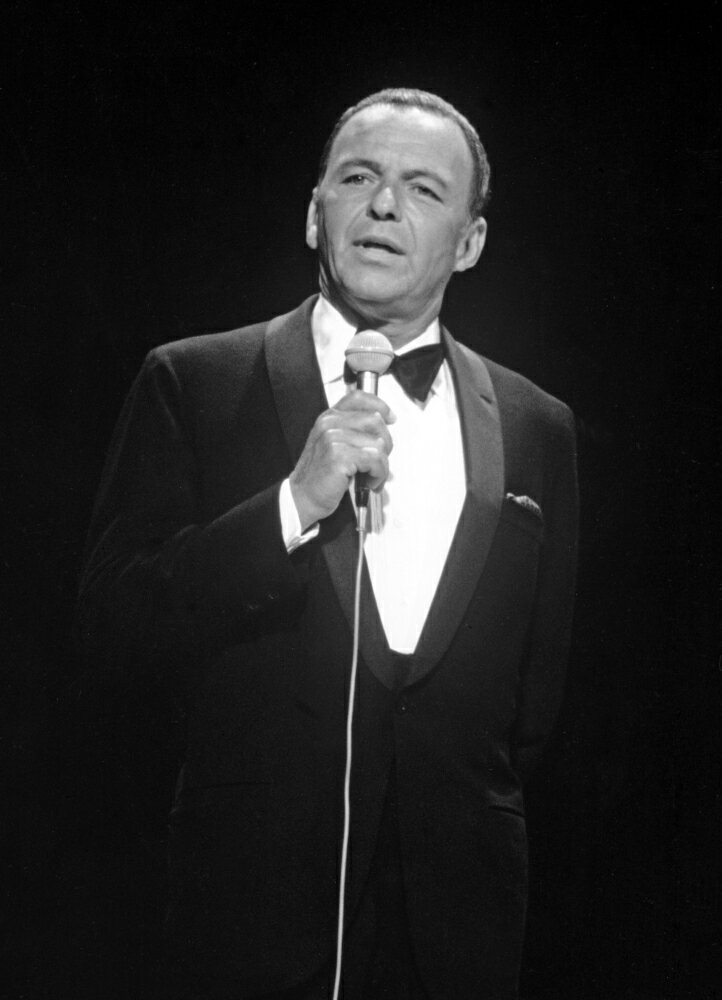 Posterazzi: Frank Sinatra Holding Microphone and singing in Suit Photo ...