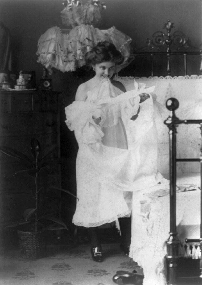 Posterazzi Woman Nightgown C1900 Na Woman Putting On A Nightgown 8489