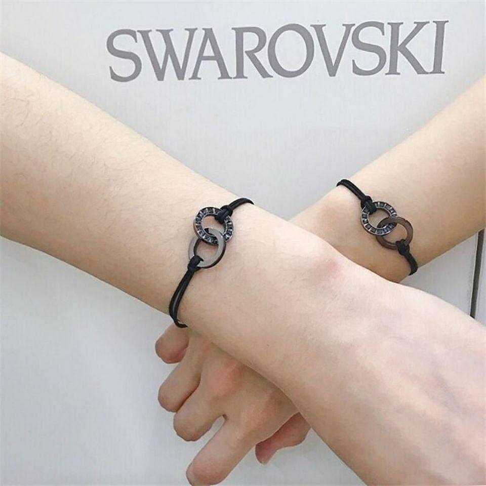 【百貨屋二號】Swarovski 施華洛世奇 施家新款情侶手繩黑炭紋理雙環相扣手鏈永結同心男士編織繩子手繩