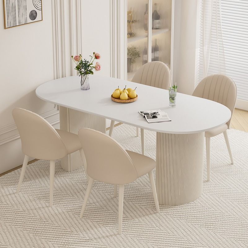 輕奢奶油風巖板餐桌現代簡約客廳家用橢圓形純白桌面餐桌椅組合