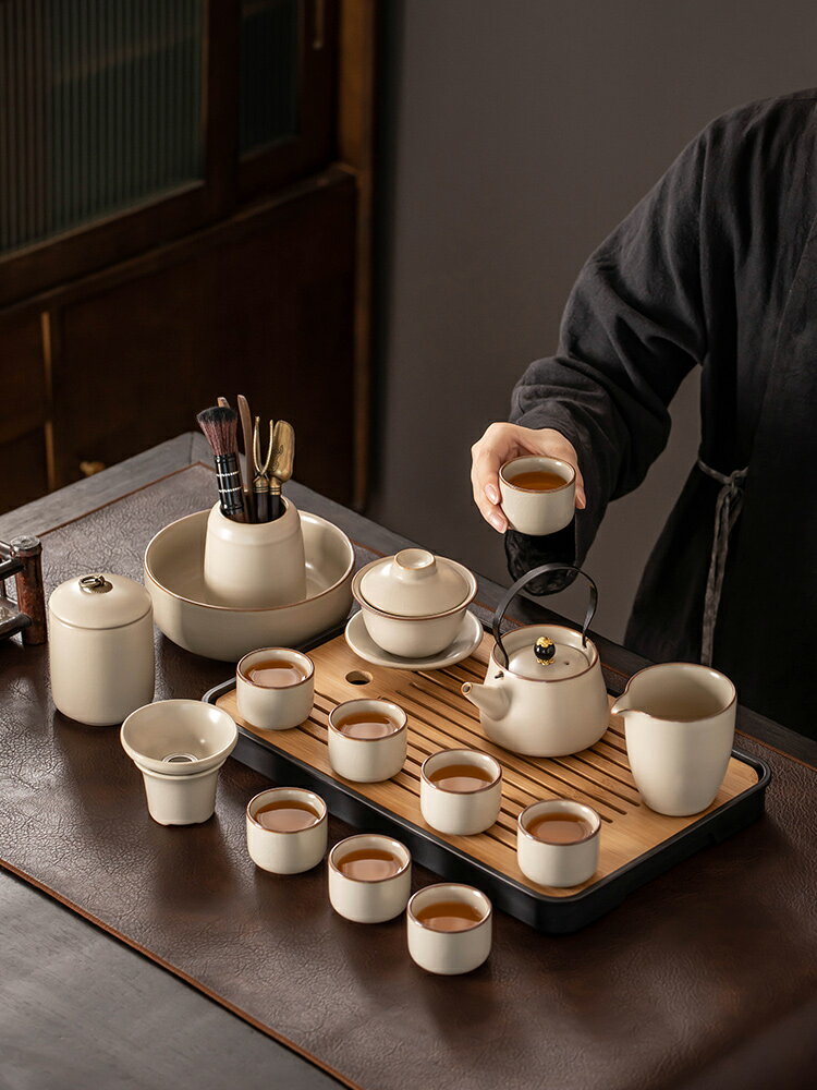 高階感簡約功夫茶具套裝家用陶瓷泡茶壺蓋碗輕奢高檔喝茶中式提樑壺