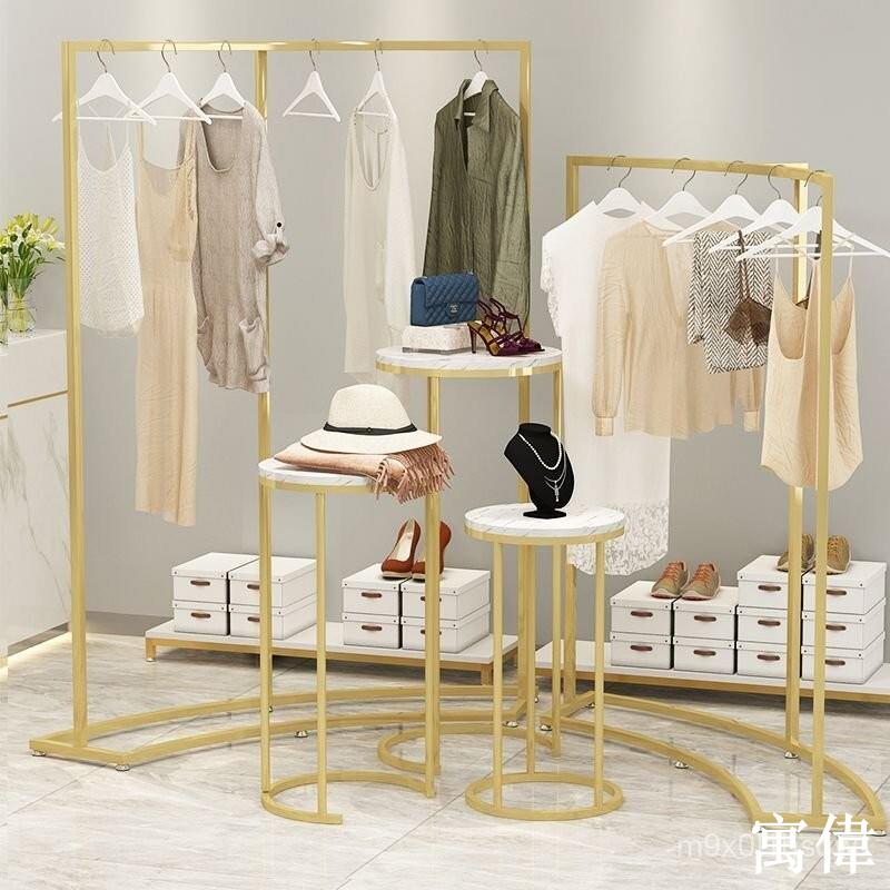 免運 弧形服裝店展示架歐式衣服架子鐵藝中島陳列架落地式女裝組閤衣架貨架 掛衣架 落地衣 收納架 服飾架