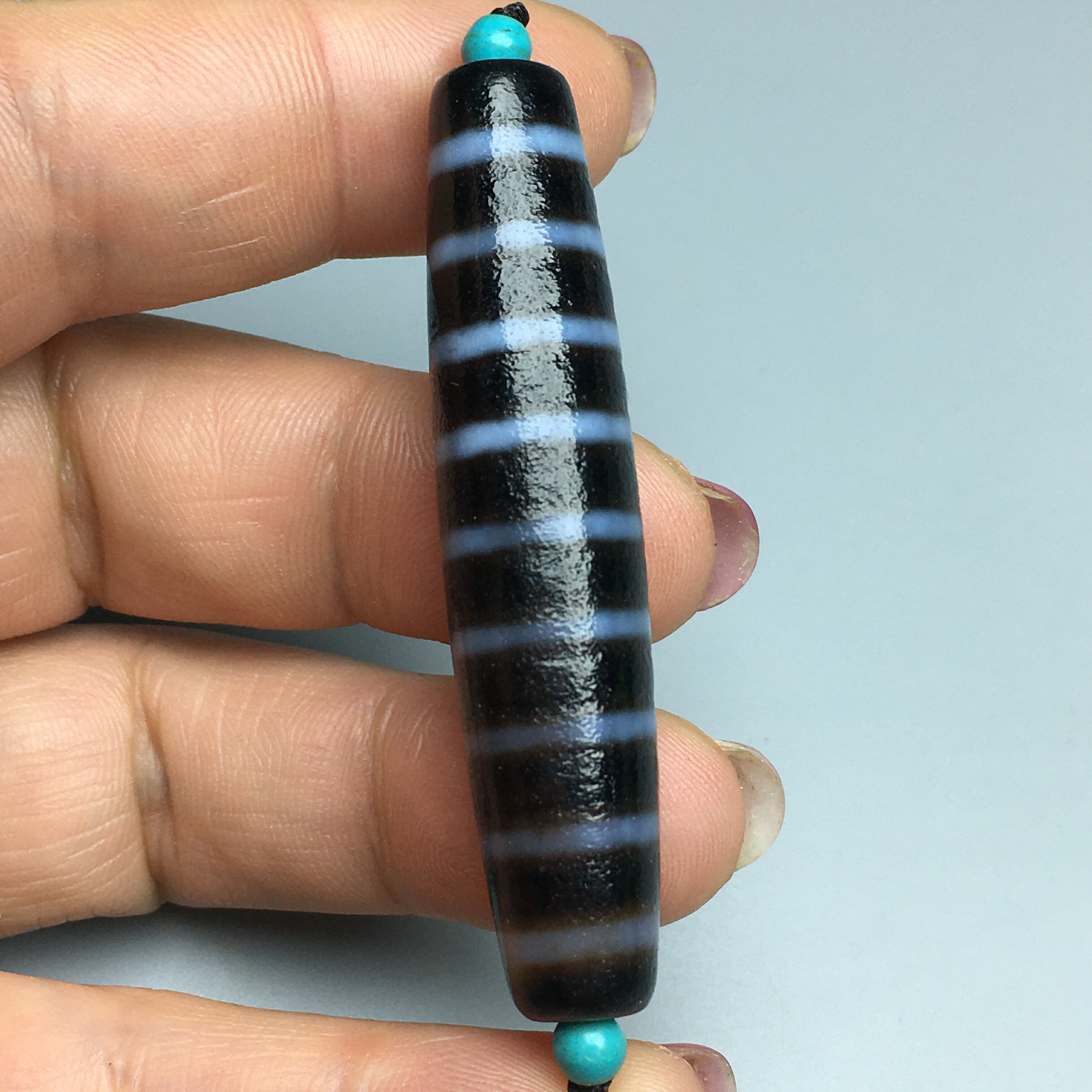 西藏千年至純旁系線珠九線老天珠鑲蝕西亞黑白大開門玉髓吊墜| 協