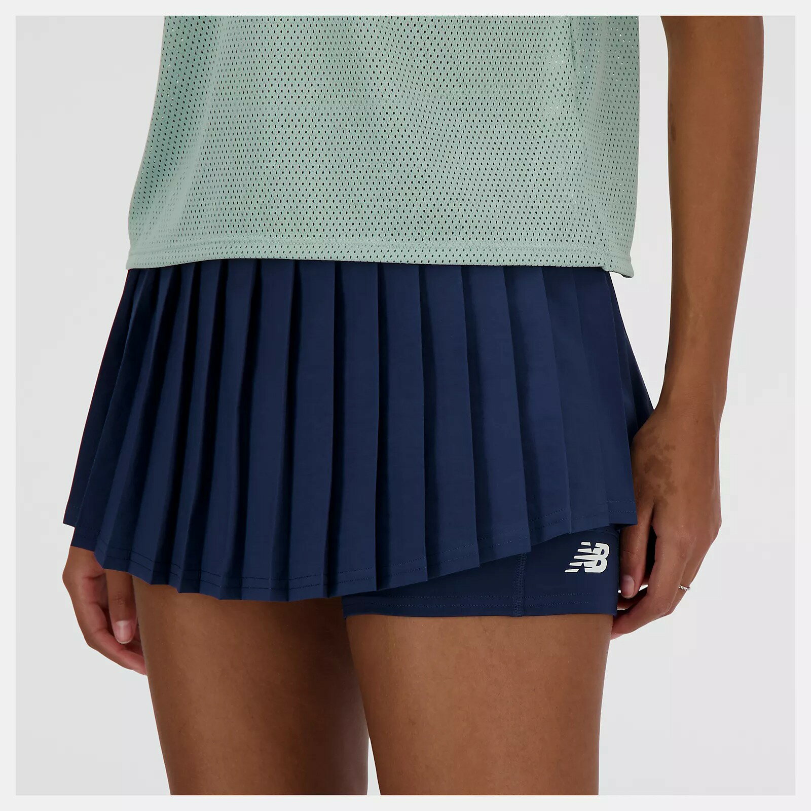 【滿額現折300】NEW BALANCE 短褲裙 NB 深藍 口袋 網球 運動褲裙 女 WK41402NNY